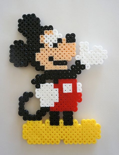 Disney Mickey Mouse standing perler beads by Shannon Landon Disney Beads, Mickey Mouse Perler Bead Patterns, Mickey Perler Bead Pattern, Hama Beads Patterns Disney, Perler Bead Patterns Mickey Mouse, Perler Mickey Mouse, Mickey Perler Beads, Perler Beads Mickey Mouse, Mickey Mouse Perler Beads