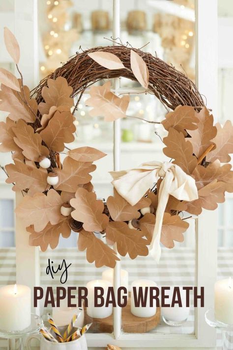 Make a fall wreath or garland for your autumn home decorations. Here's an easy Paper Wreath DIY that uses recycled paper bag leaves. You'll need a few things for this project, like a grocery store paper bag, scissors, glue, a grapevine wreath, and a white chalk pen, to name a few. Fall Paper Wreaths Diy, Paper Bag Leaves Garland, Autumn Paper Flowers, Fall Wreath Ideas Diy Autumn, Autumn Paper Decorations, Thanksgiving Paper Decorations, Paper Bag Crafts Diy, Paper Bag Decoration Ideas, Thanksgiving Adult Crafts