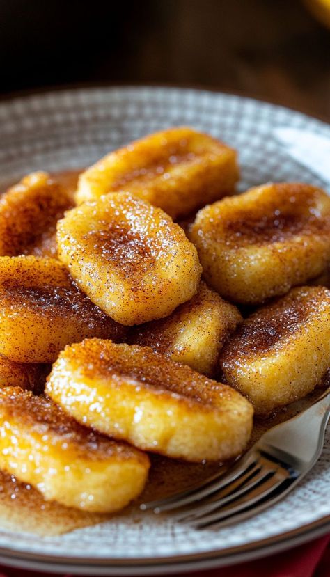 These crispy pan-fried cinnamon bananas are a quick and easy dessert or snack. Coated in cinnamon and sugar, then fried until golden and crispy, they’re perfect for satisfying your sweet tooth with minimal effort. Serve as a side or enjoy as a solo treat! Cinnamon Bananas, Bananas Recipe, Caramelized Fruit, Cinnamon Banana, Easy Treats, Breakfast Snacks, Banana Recipes, Easy Dessert, Easy Desserts