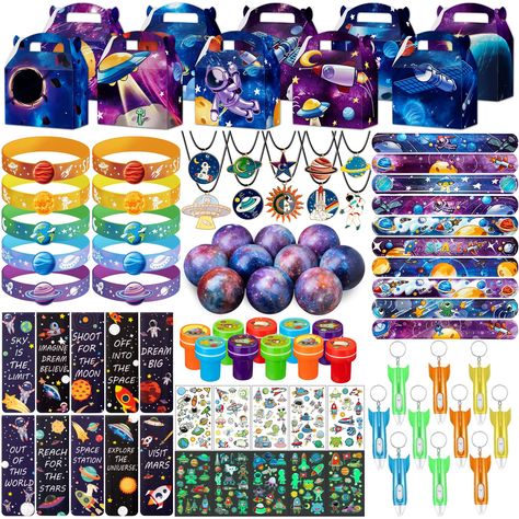 PRICES MAY VARY. 🎉PACKAGE INCLUDED - 10 Galaxy stress balls, 10 slap bracelets, 10 styles self-Ink stamps, 10 planet bracelet, 10 styles outer space themed gift box, 10 rocket flashlight keychain, 10 astronaut style bookmark, 10 luminous tattoo stickers, 10 necklace. 🎉SPACE THEMED DESIGN - Absolutely the favorite Outer Space design for kids. The rockets, Sun, Moon, Galaxy, Outer Space, astronauts, aliens, UFOs, and more patterns are very attractive. It fit all of the space themed birthday part Outer Space Party Favors, Space Party Favors, Stamp Necklace, Astronaut Party, Space Theme Party, Outer Space Party, Outer Space Birthday, Space Birthday Party, Glow In Dark