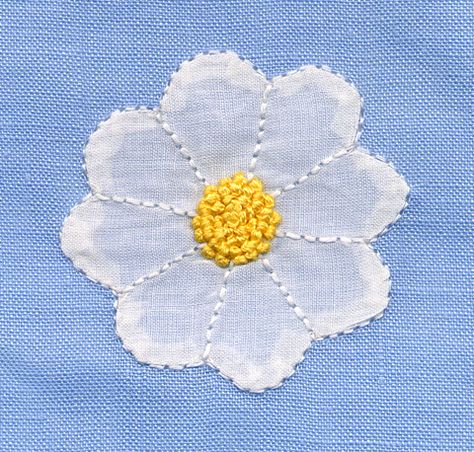 Cotton organdy daisy appliqued to blue linen with pinstitch. Yellow center is French knots. Featured in May 1991 Creative Needle Magazine. Made by Trudy Horne. Embroidery Stitches Beginner, Hand Embroidery Patterns Flowers, Applique Quilting, Basic Embroidery Stitches, Handmade Embroidery Designs, Embroidery Book, Hand Embroidery Flowers, Embroidery Flowers Pattern, Handwork Embroidery Design