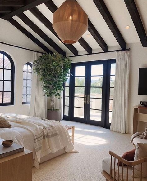 Cold, rainy, January days in Oklahoma got me wishing I was cozied up in this bedroom. All. Day. Long. Loving the pops of black as of lately.🖤🖤⠀ Design: @studiolifestyle_ .⠀ .⠀ .⠀ #studiocassa #architecture #interiors #grandlake #brokenarrow #tulsa #okc #grandlakearchitecture #lakehomes #lakehouses #okiearchitecture #oklahomadesigner #moderntudor #blackexteriors #steeproofs #communityovercompetition #womeninbusiness #womeninarchitecture Black Beams, Ashley Stark, Apartment Decoration, 3d Studio, Black Ceiling, Ceiling Beams, House Inspo, Interior Design Inspiration, House Inspiration