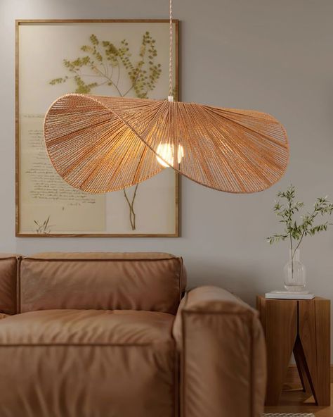 This lighting rattan lighting fixture is such a bold statement piece and totally adds character to any space. 💬 #StatementPiece #InteriorDesign Hat Pendant Light, Bungalow Interior, Floppy Straw Hat, Rattan Lamp, Bamboo Pendant Light, Energy Efficient Design, Hanging Ceiling Lights, Kitchen Pendant Lighting, Dining Room Lighting