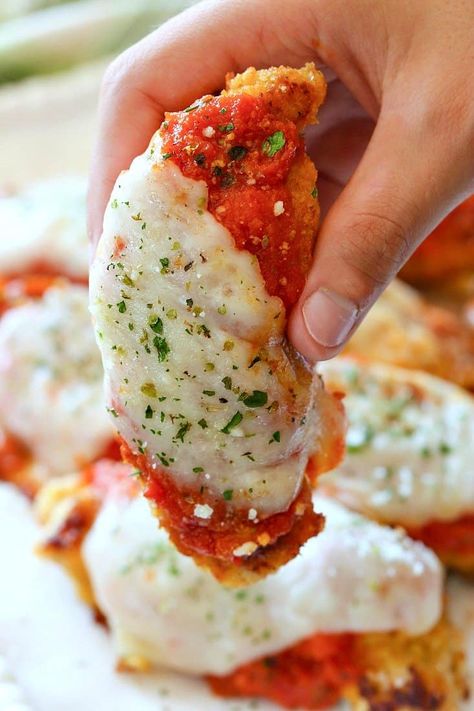 Parmesan Chicken Tenderloins are a family favorite diner! Crispy, baked chicken topped with sauce and mozzarella cheese! #easychickenrecipes #chickenrecipes #chickentenderloin #dinner #recipes #familydinner #easyrecipes Dinner Ideas With Chicken Tenderloins, Breaded Chicken Tenderloins, Easy Parmesan Chicken, Chicken Parmesan Dinner, Easy Chicken Tenderloin Recipes, Baked Chicken Tenderloins, Parmesan Dinner, Easy Oven Baked Chicken, Oven Baked Chicken Parmesan