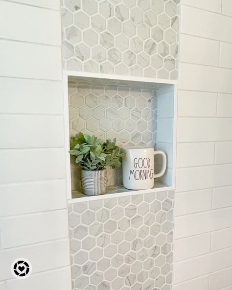 The mosaic carrera marble look porcelain tile accent strip Is my favorite feature in my shower. It is also on the shower floor. The larger format subway tile is in all the other walls. Follow my shop @live.love.shiplap on the @shop.LTK app to shop this post and get my exclusive app-only content! #liketkit #LTKFind #LTKstyletip #LTKhome @shop.ltk #showerdesign #homedesignideas #interiordesign #masterbathroomideas #bathroomideas Bathroom Tour, Master Bath Renovation, Subway Tile Showers, Small Bedroom Remodel, Master Bath Shower, Bath Renovation, Master Shower, Carrera Marble, Bedroom Remodel