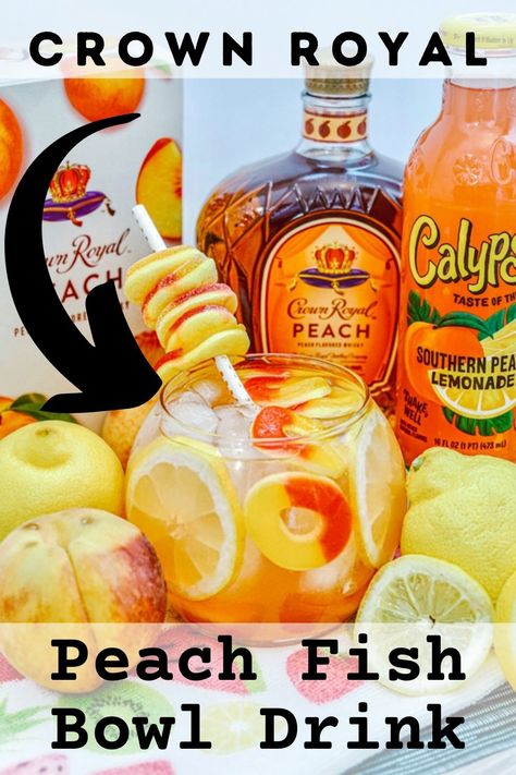 This Fish Bowl Drink made with Crown Royal Peach, Southern Peach Lemonade, peach rings, and lemons is sure to be a hit when you serve it to adult friends and family! These Crown Royal Peach Fish Bowl Drink will be the hit of your pool party, BBQ or just sitting on the deck. Fish Bowl Drink, Pool Party Bbq, Fishbowl Drink, Crown Royal Peach, Crown Royal Drinks, Royal Recipe, Best Mixed Drinks, Peach Bowl, Peach Drinks