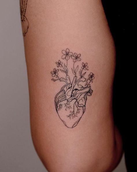 Fine Line Anatomical Heart Tattoo With Flowers, Heart Arm Tattoos For Women, Heart Into Flower Tattoo, Upper Arm Heart Tattoo, Red Real Heart Tattoo, Grow Together Tattoo, Realistic Heart With Flowers Tattoo, Flower Hearts Tattoo, Realistic Heart Tattoo Flowers