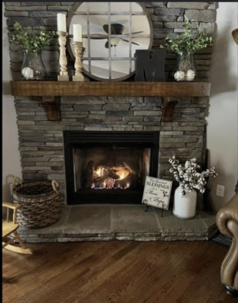 Neutrals House Decor, Stone Paneling Interior, Fireplace With Fake Logs, Picture On Mantle Fire Places, Fireplace Mantle Decor 2023, Ranch Mantle Decor, Faux Fireplace Mantels Stone, Wood Mantles On Stone Fireplace, Fireplaces For Small Spaces