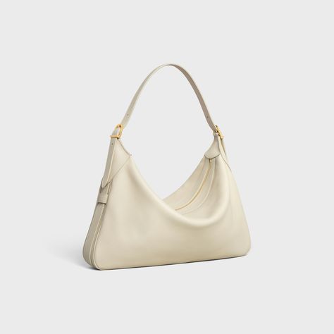 large romy in Supple Calfskin - Limestone | CELINE Soft Bags, Fragrance Bottle, Fancy Bags, Naturalizer Shoes, New Sneakers, New Fragrances, Card Holder Wallet, Chain Bags, Small Leather Goods