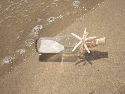 Message in a bottle beach theme wedding by WeddingsofSanDiego Message In A Bottle Aesthetic, Message In A Bottle Wedding, Bottle Aesthetic, Renewing Vows, Wedding Invitation Message, Beach Wedding Invitation, Wedding Bottles, Beach Wedding Invitations, Unique Invitations