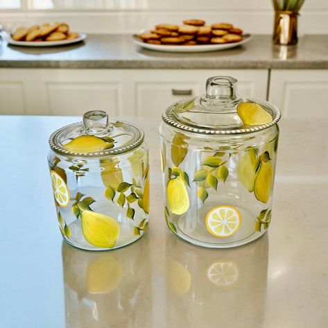 Painted gallon cookie jar lemons, lemon themed candle holder kitchen table decor, summer wedding gift, pretty  laundry detergent dish Kitchen Lemon Theme, Lemon Kitchen Decor Ideas, Lemon Themed Kitchen, Citrus Kitchen Decor, Painted Lemons, Lemon Table Decor, Glass Jars Diy, Large Flower Vases, Jars Diy