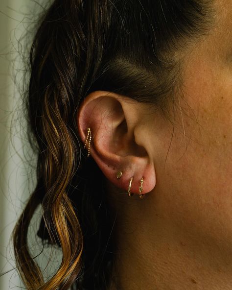 A curated ear stack is perfect for making your style instantly more elevated ✨ Perfect for mixing and matching, these 14k gold pieces will give you endless ear combos ✨ Elegant Ear Stack, Mixed Metal Earring Stack, Elegant Ear Piercings, Curated Ear, Ear Stack, February 15, Gold Piece, Stacking Rings, Tattoos And Piercings