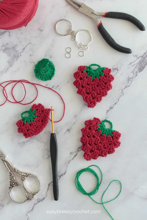 Easy Crochet Strawberry Keychain Pattern | Easy Breezy Crochet Crochet Strawberry Keychain, Strawberry Keychain, Keychain Tutorial, Crochet Keychains, Keychain Pattern, Crochet Strawberry, Crochet Keychain Pattern, Yarn Thread, Crochet Dress Pattern