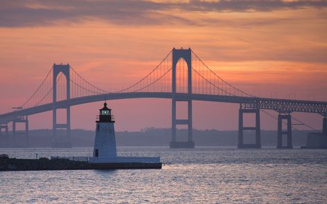 Goat Island Lighthouse and Newport Bridge- TownandCountrymag.com Lighthouse Pictures, Beautiful Lighthouse, Newport Rhode Island, Light Houses, Newport Ri, Light House, A Bridge, Bay Bridge, Golden Gate Bridge