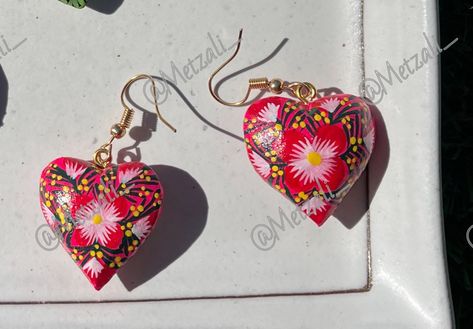 These beautiful hand painted earrings come from Oaxaca Mexico. Every design is intricately hand painted with acrylic paint, it is safe and water resistant. Each of these earring sets take about 3-4 days to be made from start to finish. A skill that has been passed down from generation to generation. They are carved out of copal wood, which is a native tree to the area. Hand Painted Earrings, Earring Sets, Painted Earrings, Wood Hearts, Wooden Heart, Hand Paint, Wooden Hearts, Wood Earrings, Shopping Websites