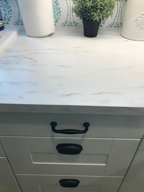 I love these Ikea countertops.  Not too garish like Formica's marble design.  They clean up and look like new 24/7! Ekbacken Countertop Marble, Ikea Ekbacken Countertop, Marble Laminate Countertops, Ikea Countertops, Ikea Countertop, Ekbacken Countertop, Bathroom Plan, Bathroom Plans, Laundry Room Renovation