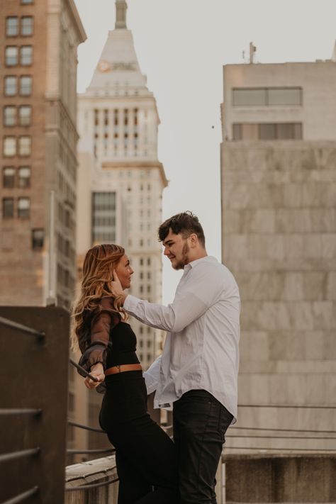 Couples Photoshoot Location Ideas, Downtown Couple Pictures, Couple Picture Ideas Downtown, Rooftop Parking Garage Engagement Photos, City Couple Poses, Couples Photoshoot Parking Garage, Parking Deck Photoshoot Couples, Sunset Rooftop Photoshoot, Couple Rooftop Photoshoot