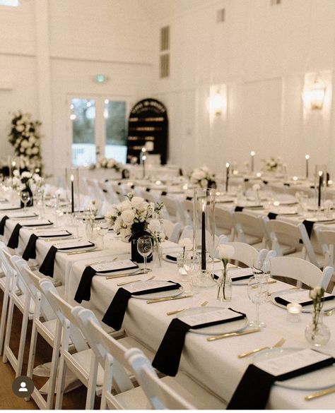 Black And White Wedding On A Budget, Minimalist Black Wedding Decor, Black And Cream Table Setting, Black And White Long Table Setting, Wedding White Tablecloth Black Napkins, Wedding Favors At Place Setting, White Tables With Black Chairs Wedding, Black And White Formal Decorations, White Silver And Black Wedding