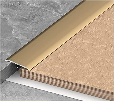 Metal Floor Transition Strip, Brass Threshold Strip, Transition Strip Ideas Floors, Floor Transition Ideas Uneven, Threshold Transition, Tile To Wood Transition, Marble Threshold, Floor Transition Strip, Marble Laminate