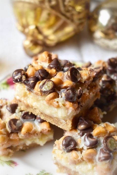 Upgraded Magic Cookie Bars ⋆ Cottage Kitchen ⋆ SomeTyme Place Magic Bars Recipe, Magic Cookie Bar Recipe, Magic Cookie Bars, Magic Bars, Shortbread Bars, White Pizza, Recipes Christmas, Butterscotch Chips, Cookie Bar Recipes