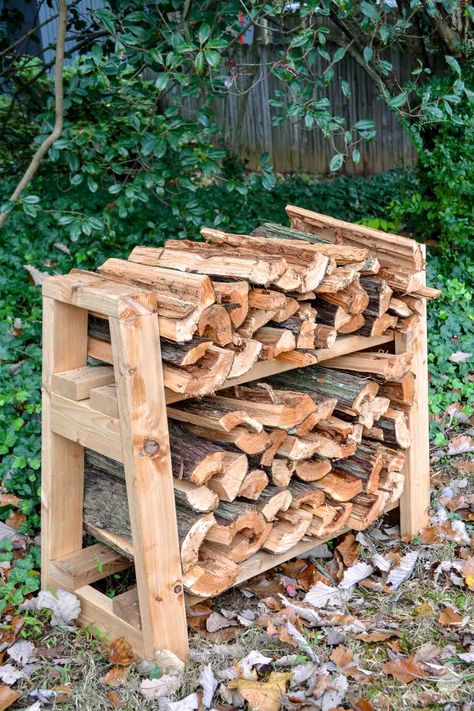 This small but mighty DIY firewood rack stand can hold a lot of firewood! See how I built this stand for my front porch in this step by step tutorial with free build plans. #firewood #diy #scrapwood #cedar #firewoodrack #firewoodstand #winter #fireplace #woodworkingplans #buildplans #freeplans Diy Wood Rack, Firewood Rack Plans, Firewood Stand, Firewood Storage Outdoor, Winter Fireplace, Outdoor Firewood Rack, Firewood Shed, Firewood Holder, Wood Storage Sheds