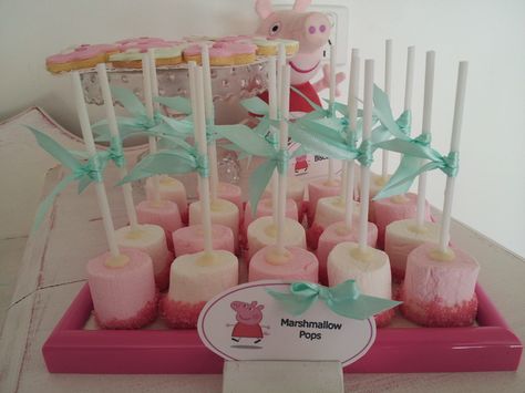 peppa pig 5th birthday | CatchMyParty.com Peppa Pig Snack Ideas, Peppa Pig Treats Table, Peppa Pig Winter Birthday Party, Peppa Pig Muddy Puddles Party Ideas, Peppa Pig Birthday Party Food, Peppa Pig Birthday Party Muddy Puddles, Candy Bar Peppa Pig Ideas, Peppa Pig Birthday Decorations, Peppa Birthday