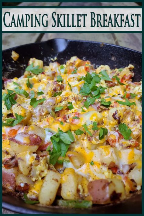 a cast iron skillet of potatoes, peppers, bacon, eggs, and cheese, topped with parsley. Overlaid text says camping skillet breakfast. Iron Skillet Breakfast Recipes, Iron Skillet Breakfast, Rv Camping Recipes, Campfire Potatoes, Breakfast Potatoes Skillet, Skillet Breakfast, Campfire Breakfast, Breakfast Skillet Recipes, Eggs And Cheese