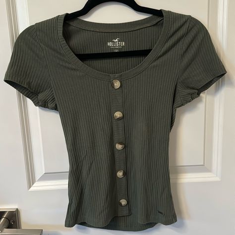 Dark Green / Olive Green Short Sleeve Top With Decorative Buttons Down New Without Tags - No Flaws! Coming From A Clean, Smoke And Pet Free Environment! Question? Leave Me A Comment Below! Fast Shipping On All Orders! No Returns Serious Inquires Only! I Take Pictures And Video Of Sold Item/S During Packaging For Security! Make Sure To Accept Your Order Once Received Or I Will Not Sell To You Again :) Rack #4 Green Shirts, Lace Front Top, College Wear, Olive Green Shorts, Earthy Outfits, Hollister Shorts, Green Olive, Decorative Buttons, Take Pictures