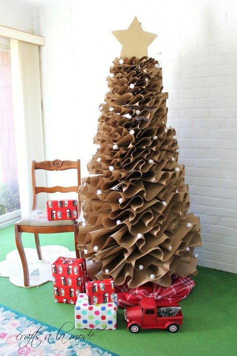 This is definitely an alternative to a traditional tree and yet it's pretty awesome. Hope you agree.... I used the Scotch brand brown paper p… Alternative Christmas, Alternative Christmas Tree, Real Christmas Tree, Diy Snowman, Unique Christmas Trees, Traditional Christmas Tree, Paper Christmas Tree, Christmas Tree Crafts, Christmas Tree Stand