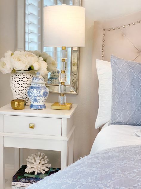 White Coastal Nightstand, Glam Coastal Decor, Costal Chic Bedrooms, Coastal Grandmillenial Bedroom, French Coastal Bedroom, Nightstands Decor, Coastal Glam Bedroom, Coastal Grandmother Bedroom, Blue And White Bedrooms