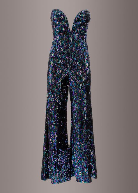 Shimmer and shine in this beautiful sequin jumpsuit! You’re ready for a party in this sleeveless jumpsuit that is covered in sparkly sequins. Dazzle all night long in this glittery sequined romper that features a sleeveless design, a deep v neckline and wide leg pants. Available in sizes S, M, and L. Made out of 100% polyester. Make an unforgettable entrance in this glamorous sequin jumpsuit. Glitter Jumpsuit Sparkle, 70s Sequin Dress, Christmas Gala Outfit, Decades Party Outfit, Retro Disco Outfit, Disco Outfit For Women, Disco Skating, Sparkle Jumpsuit, Sequins Jumpsuit