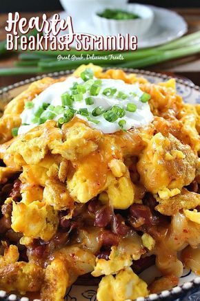 Hearty Breakfast Scramble is loaded with ham, potatoes, chili, scrambled eggs, cheese with sour cream and chives. #breakfastrecipes #eggs #scrambledeggrecipes #delish #greatgrubdelicioustreats Breakfast Scramble, Scrambled Eggs With Cheese, Breakfast Recipes Easy Quick, Outdoor Cooking Recipes, Scrambled Eggs Recipe, Breakfast Casserole Easy, Vegetable Soup Recipes, Sausage Gravy, Best Breakfast Recipes