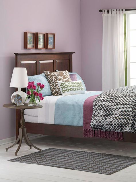 Easily update the look of your bedroom with these beautiful bedding ideas. Create a new and stylish look to your bedroom with updated bedding that will change the whole look to your room. Plum Bedroom, Lavender Bedroom, Restful Bedrooms, Purple Bedrooms, Purple Bedroom, Purple Rooms, Brown Furniture, Woman Bedroom, Purple Walls