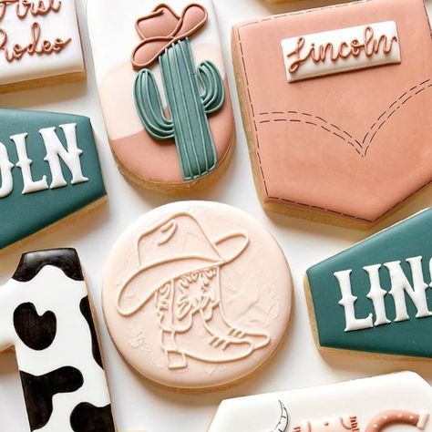 A Lil Something Sweet Custom Cookies on Instagram: "Yeehaww it’s Lincoln’s 1st Rodeo!! 🤠  Balloon arch template from @maddiescookieco  • • • #bake #baker #cookies #cookie #cookier #cookiesofinstagram #cookiedecorating #cookieart #cookielettering #cowboycookies #firstbirthday #firstbirthdaycookies #1stbirthdaycookies #birthdaycookies #rodeocookies #firstrodeocookies #cactuscookies #cowcookies #sugarcookies #sugarcookiesofinstagram #sugarcookie #sugarcookiedecorating #sugarcookiesdecorating #sugarcookieart #royalicing #royalicingcookies #designercookies #customcookie #customcookies #alilsmthsweetcookies" Western Cookies Decorated, Cowboy Themed Cookies Decorated, Cowgirl Cookies Decorated, Rodeo Cookies, Rodeo Birthday Cookies, Western Sugar Cookies, Western Cookies, Texas Themed Cookies Decorated, Cowboy Theme Cookies