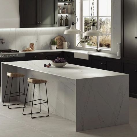 Silestone Ethereal Haze is a stunning marble-effect quartz stone from the 2021 Ethereal Series made with sustainable HybriQ+ technology. It combines grey and deep black veins on a marvellous white backdrop. It's available in slabs with sizes of 3250x1590mm and thicknesses of 12mm, 20 mm and 30mm. You can also choose your favourite finish from polished and Suede (matt with a light texture) Visit The Worktop Library in London to receive your free Samples! Grey Kitchen Countertops Quartz, Grey Kitchen Countertops, Design Sustainability, Countertop Slabs, Quartz Kitchen Countertops, Concrete House, White Backdrop, City Apartment, Colonial House