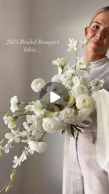 Morgan Cullimore┋ Florist on Instagram: "✨2024 Bridal Bouquet Inspo ✨ The classic, all white bouquet … with a slight cascade ;)   What do we think?!? 🤩 anyone doing white for their wedding this year?!" Cascade Wedding Bouquet White, February Bridal Bouquet, Modern Cascading Bouquet, White Wedding Bouquets Elegant, Modern Bouquet Wedding, Wedding Bouquets Cascade, White Cascading Bridal Bouquet, Classy Bouquet, All White Wedding Bouquet