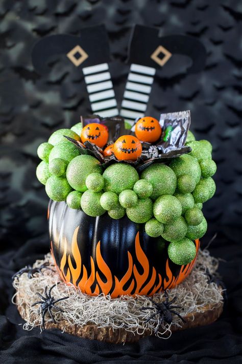 How to make a Cauldron Pumpkin Candy Holder in a few easy steps using a craft pumpkin, styrofoam balls, and vinyl. Trick or treaters will love this bubbling cauldron pumpkin filled with candy! Pumpkin Candy Holder, Creative Pumpkin Decorating, Tall Pumpkin, Pumpkin Carving Contest, Pumpkin Decorating Contest, No Carve Pumpkin Decorating, Pumpkin Vase, Creative Pumpkin Carving, Pumpkin Contest