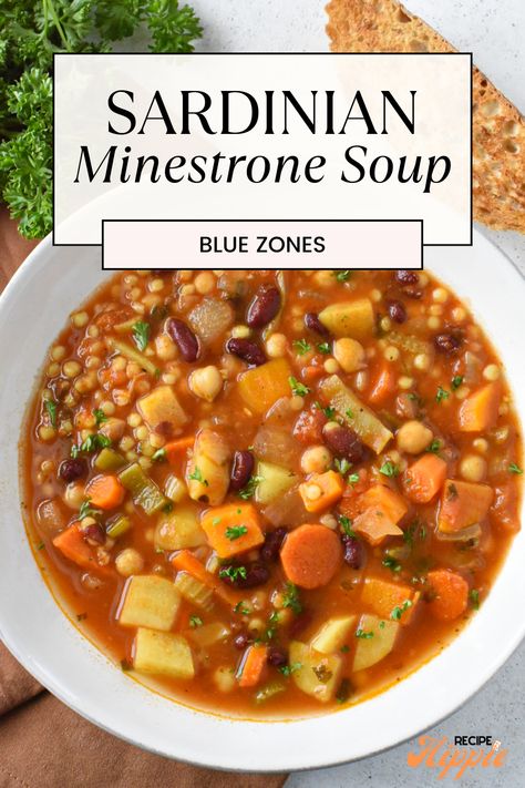 Sardinian minestrone soup gained popularity through the captivating Netflix documentary ‘Blue Zones’. This soup features a large variety of hearty and nutritious seasonal vegetables, beans, and spices, making it delicious and super healthy. It’s incredibly versatile, and in this specific Sardinian minestrone recipe, we save time and effort by using canned beans! If you're looking for healthy soup recipes, this is the best one! 3 Bean Minestrone Blue Zone, Blue Zones Sardinian Minestrone, Vegetable Soup Minestrone, Three Bean Minestrone Soup Blue Zone, Sardinian Longevity Minestrone, Pasta House Minestrone Soup Recipe, Plant You Minestrone, Minestrone Soup Blue Zone, Blue Zones Minestrone Soup