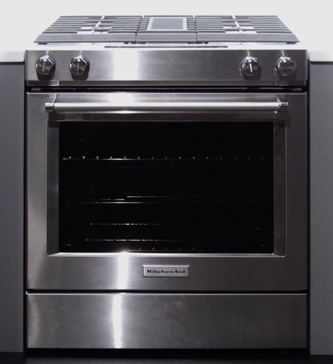 The KitchenAid KSDG950ESS downdraft range features built-in ventilation between the two rows of burners. Downdraft Range, Kitchenaid Range, Downdraft Vent, Split Entry Remodel, Entry Remodel, Kitchenaid Appliances, Home Interior Kitchen, Island With Stove, Stove Vent