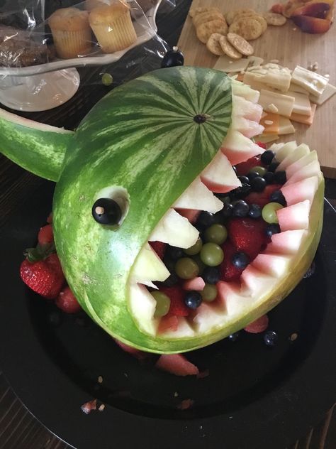 Shark Watermelon Fruit Salad Lots of fun to make! Everyone loved it. Shark Watermelon, Shark Food, Watermelon Fruit Bowls, Watermelon Fruit Salad, Watermelon Shark, Shark Stuff, Shark Week Party, Watermelon Carving, Mermaid Diy