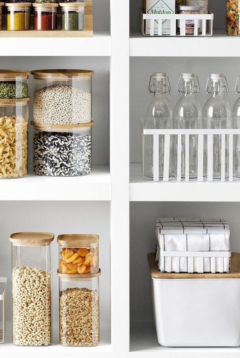 These pantry storage containers, including glass canisters and woven baskets, are perfect for organizing the space where you keep dried goods and snacks. Beautiful Pantry, Pantry Containers, Pantry Storage Containers, Cereal Containers, Airtight Food Storage, Glass Canisters, Airtight Food Storage Containers, Pantry Design, Kitchen Canisters