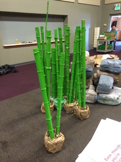 We borrowed these bamboo, which were part of our main stage. These were made from hard cardboard tubes mounted in cement-filled ice cream tubs. Submerged Vbs, Weird Animals Vbs, Ice Cream Tubs, Hawaiian Party Decorations, Vbs Themes, Stage Props, Panda Party, Fiesta Tropical, Deco Nature