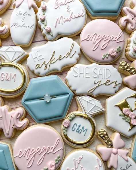 Emily’s Bake Shop on Instagram: “Still swooning over these engagement cookies 💍 next week I get to make more ring box cookies and I’m so excited to get back into my…” Custom Cookies Engagement, Engagement Cookies Simple, Engaged Cookies Decorated, Engagement Ring Decorated Cookies, Ring Cookies Engagement, She Said Yes Cookies Decorated, Royal Icing Engagement Cookies, Engagement Party Cookies Simple, Proposal Cookies Engagement