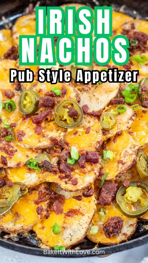 These Irish nachos are layered potato slices topped with cheese, bacon, jalapeno, and more to make a fantastic finger food! Some things are just better when baked in cast iron, and these loaded Irish pub nachos are a perfect example of how true that is. Any way that you decide to serve them, they are always a popular favorite that never lasts long! BakeItWithLove.com #bakeitwithlove #Irish #nachos #pubfood #StPatricksDay #appetizers #potatoes Irish Nachos, Baked Potato Toppings, Baked Potato Chips, Potato Nachos, Potato Appetizers, Layered Potato, Potato Slices, Potato Toppings, Veggie Delight