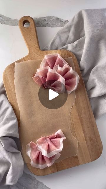 WildSalt Studio | Tyler on Instagram: "🪭😍 Simple prosciutto fans. Will you try this?  Pro tip: freeze the prosciutto fans before adding to your charcuterie platter! They thaw in literal minutes.   #fyp #foodreels #viralfood #cookingtips" Prosciutto And Cheese Platter, Meat Plate Ideas, Prosciutto Display, Prosciutto On Charcuterie Board, Folding Prosciutto Charcuterie, Charcuterie Board Prosciutto, How To Fold Prosciutto For Charcuterie, Prosciutto Charcuterie Board, How To Make Prosciutto