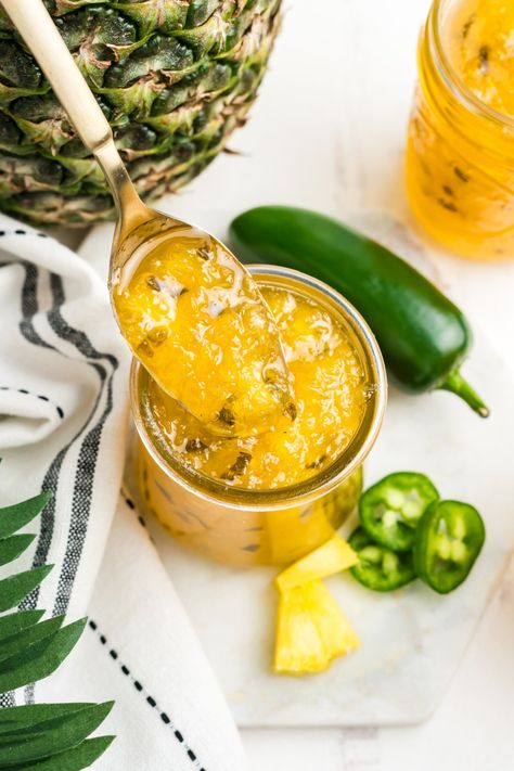 A jar of pineapple jalapeno jam with a spoon holding some jam up over the jar. via @2kitchendivas Mango Jalapeno Jam, Pineapple Jalapeno Jam, Peach Jalapeno Jam, Jalapeno Jelly Recipes, Pineapple Jelly, Pepper Jelly Recipes, Jalapeno Jam, Jalapeno Jelly, Mango Jam