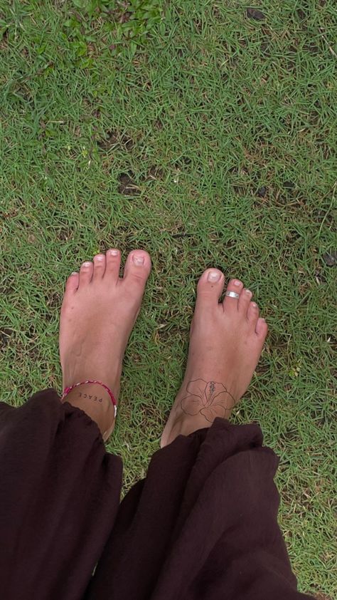 tattoo ideas small tattoo hibiscus tattoo peace stick and poke feet tattoo foot Hawaii October, Flip Flop Tattoo, Side Foot Tattoos, Flower Foot Tattoo, Tattoo Canvas, Small Foot Tattoos, Tattoo 2024, Tattoo Foot, Hibiscus Tattoo