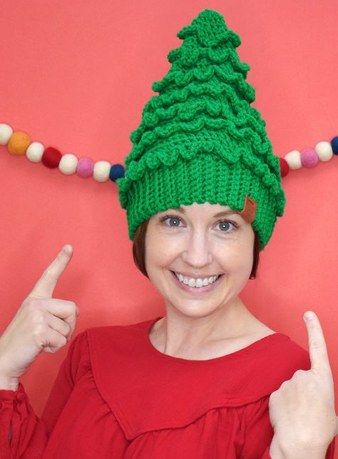 Looking for an adorable crochet hat to keep heads warm and celebrate the Christmas season? Get this adorable, FREE Christmast Tree Hat Crochet Pattern! Christmas Tree Hat Crochet, Toddler Christmas Tree, Tree Hat, Crochet Christmas Hats, Crochet Christmas Tree, Christmas Tree Hat, Foundation Single Crochet, Half Double Crochet Stitch, Crochet Christmas Trees