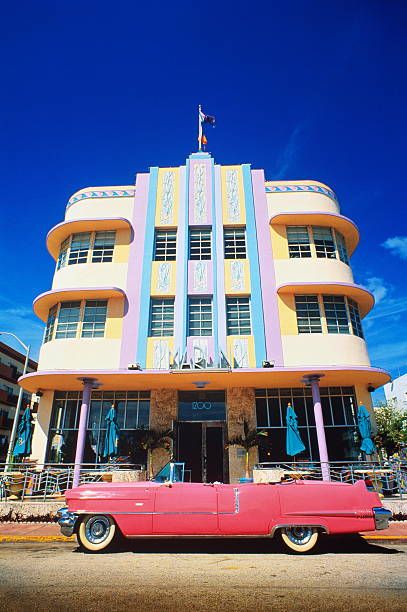 USA,Florida,Miami Beach,Art deco building,pink vintage car in fore Miami Art Deco Interior, Miami Attractions, Retro Architecture, Beach Art Deco, Miami Art Deco, Miami Photos, Miami Travel, Barbie Halloween, Florida Art