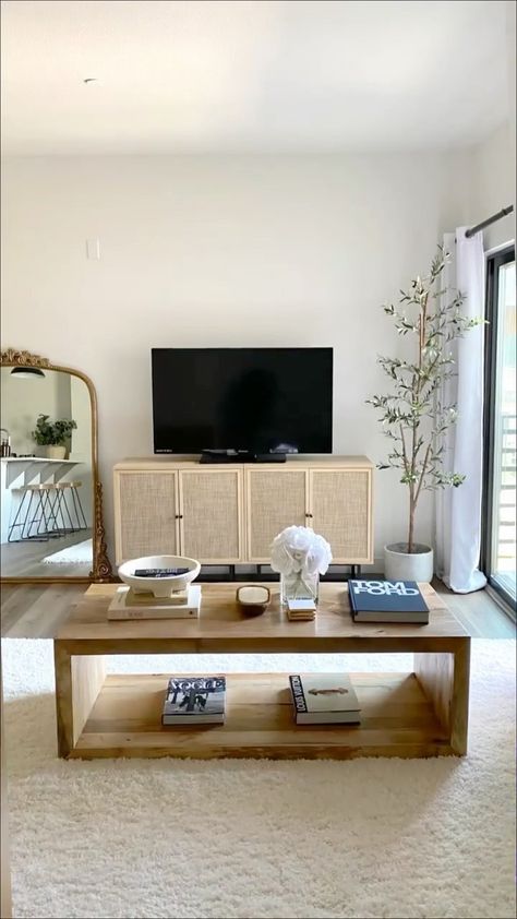 nathanjames on Instagram: A masterpiece! We LOVE a room makeover, and right in time for summer ☀️ Design tips for achieving this California-cool look below: -… Tall House Plants, Big Mirrors, Tall House, Simple Apartments, Apartment Decorating Living, Apartment Living Room Design, Small Apartment Living Room, Simple Living Room, Table Styling